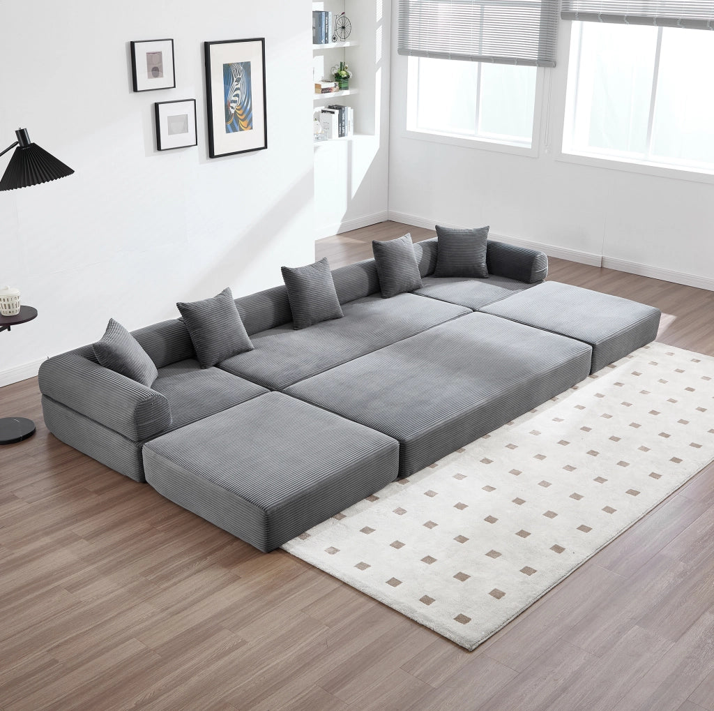 Divano modulare 270x180x64 cm con tasca laterale e funzione letto; corduroy grigio scuro