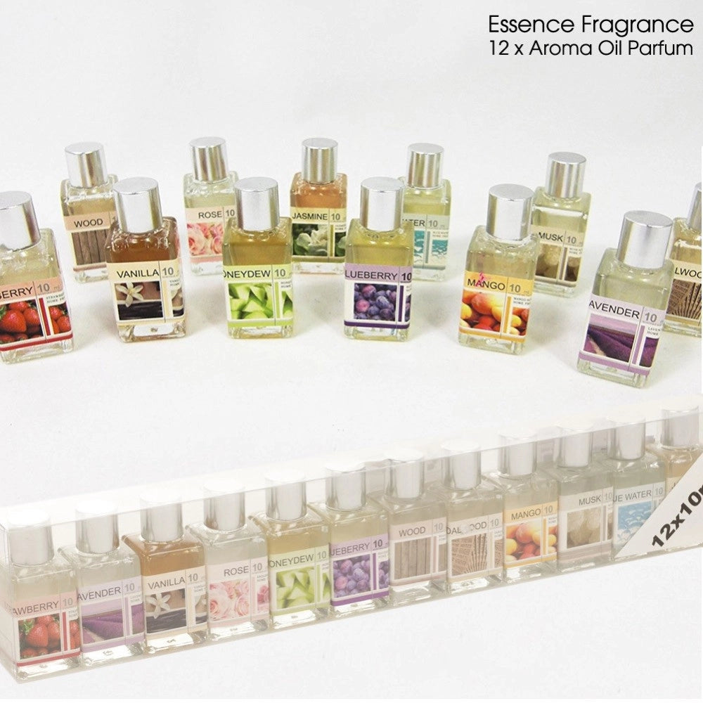Trade Shop - Set 12 Profumatori Ambiente Ricarica Olio Profumo 10ml Assortiti Per Bruciatore -