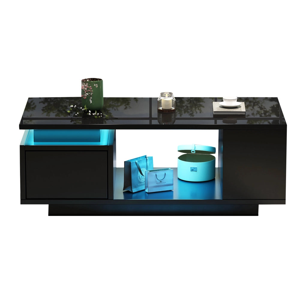 Tavolino da salotto 100x50x36 cm nero lucido con LED; cassetto e vani laterali