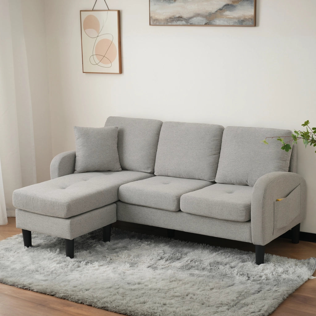 Divano angolare 3 posti con chaise longue reversibile e design modulare in tessuto grigio