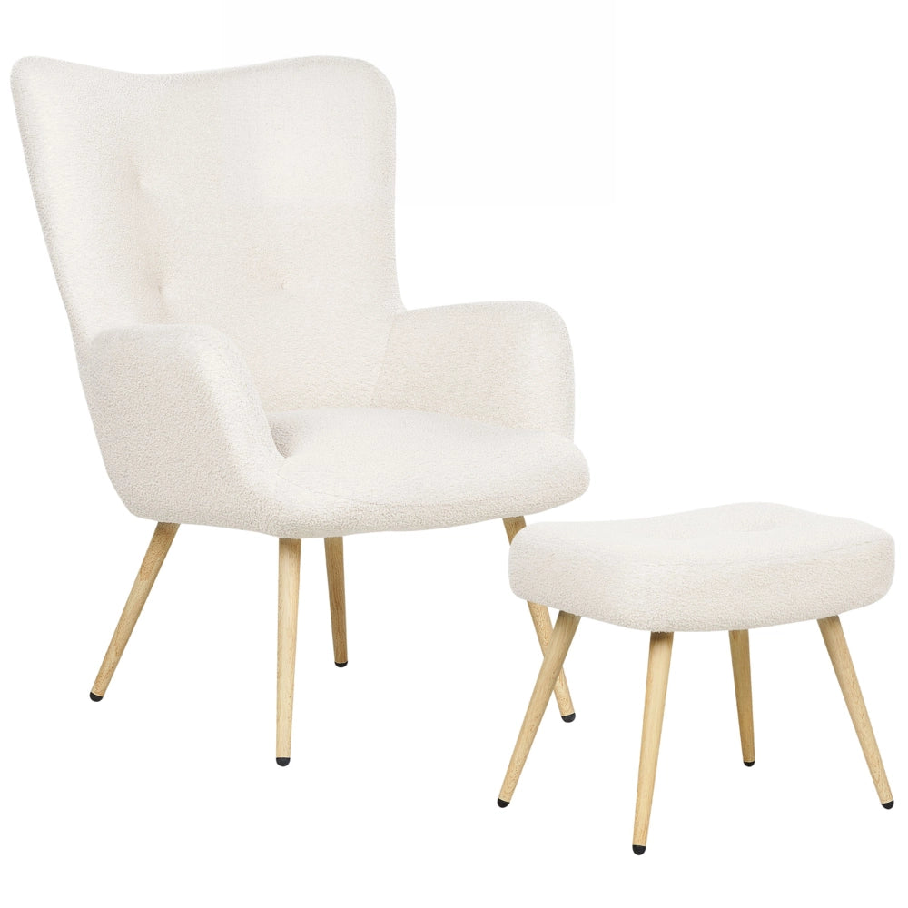 Poltrona rivestita in tessuto beige con motivo floreale con poggiapiedi in stile retrò