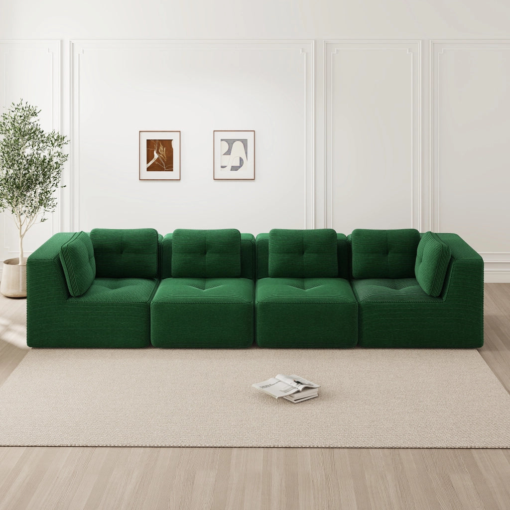 Divano angolare modulare senza montaggio con moduli flessibili seduta profonda e braccioli in velluto a coste verde