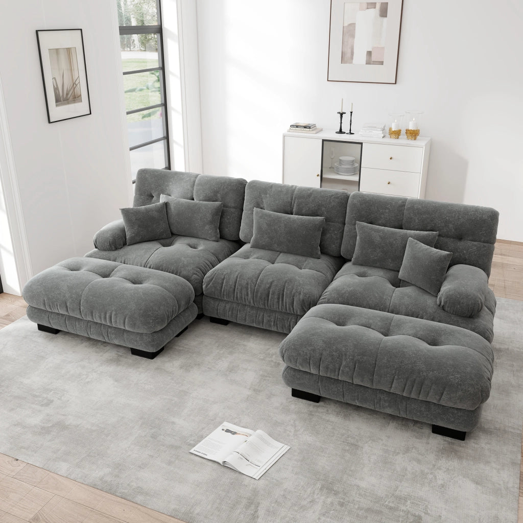 Divano angolare modulare con seduta profonda, pouf e cuscini lombari, design vintage, in ciniglia grigia