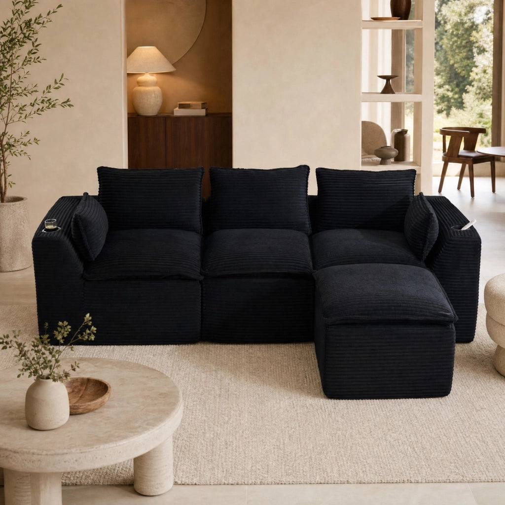 Divano modulare 256x161x75 cm con tasche laterali e molle integrate; rivestimento in velluto a coste nero
