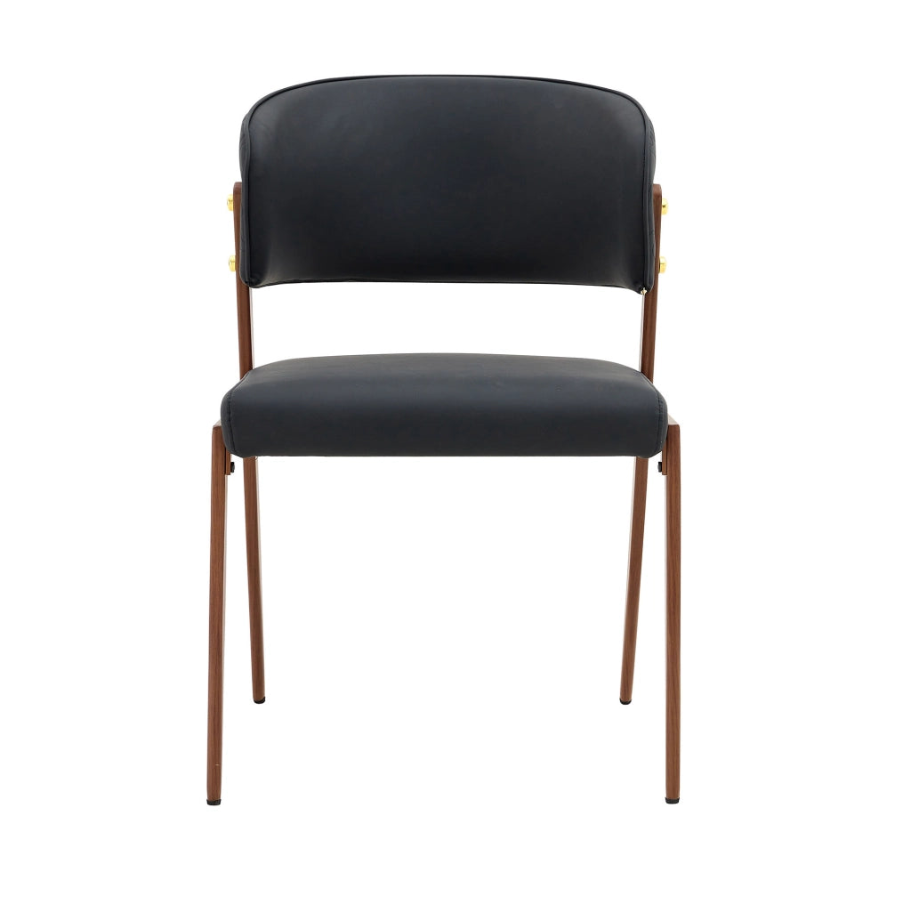 Sedia da pranzo moderna in ecopelle con schienale ergonomico e gambe in metallo nera