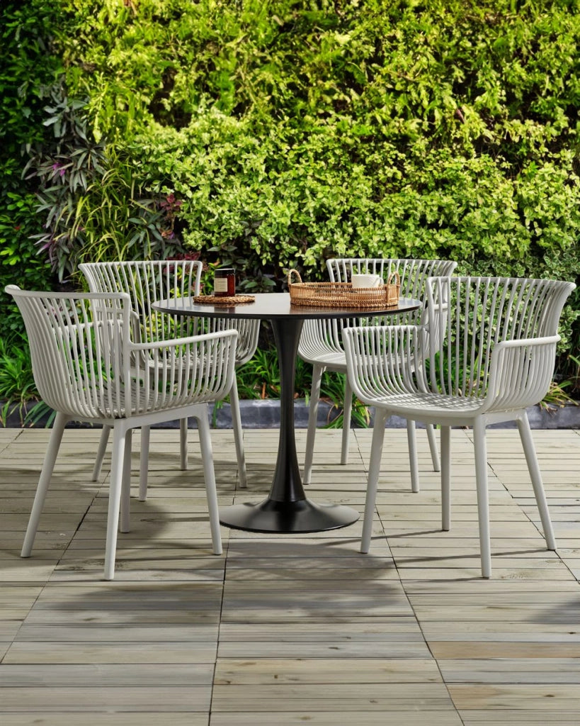 Set di 4 sedie da pranzo in plastica grigio per interni ed esterni da giardino con braccioli in stile minimalista
