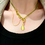 Collana a serpente fatta a mano con perline di cristallo verde, regalo di Natale o di compleanno.
