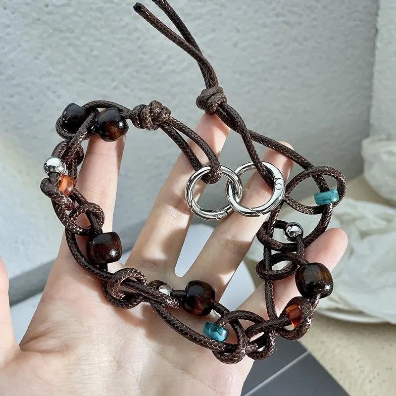 Collana fatta a mano con perline di legno marrone: cordino in pelle regolabile