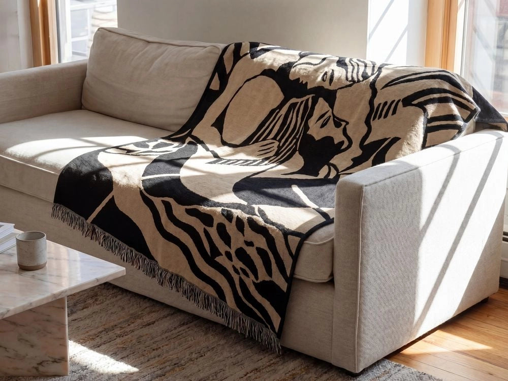 Coperta beige e nera in misto poliestere e acrilico, 130 x 170 cm, motivo astratto decorativo, motivo double face