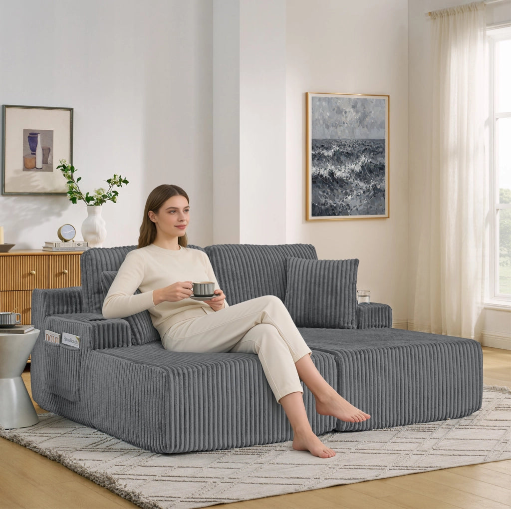 Divano relax 2 posti in tessuto a coste grigio con portabicchieri e tasca laterale