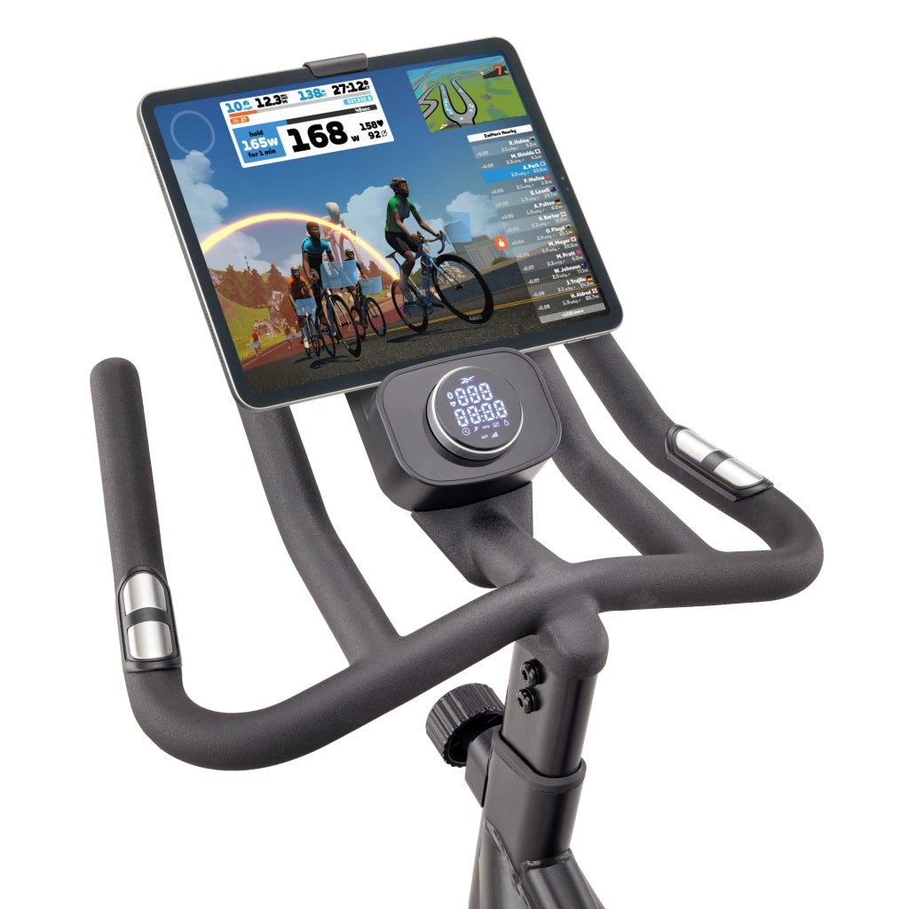 Spinning Bike de fitness Ergomètre - Reebok - Maison/Appartement - Modèle FR30 - Roue d'inertie 18 KG - Ecran LED