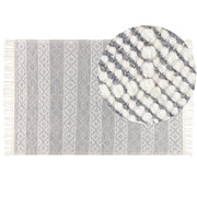 Tappeto grigio e bianco in lana e cotone 160 x 230 cm tessuto a mano a trama piatta con frange e motivo geometrico