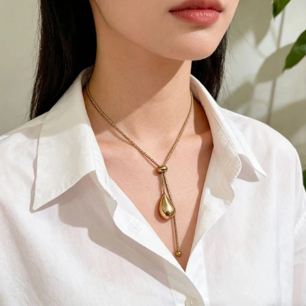 Nuova collana lunga estraibile a goccia dorata alla moda