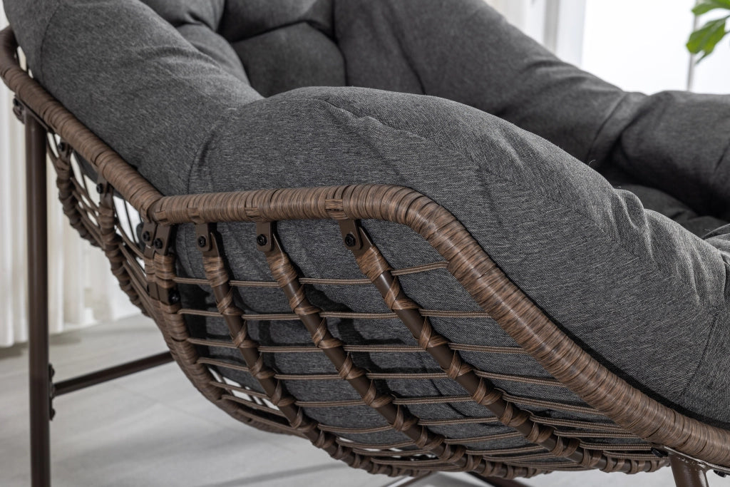 Rocking-chair da esterno in acciaio e rattan sintetico con cuscino spesso grigio 78 × 106 × 90 cm