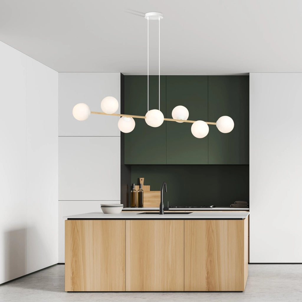 Lampada a sospensione Gravity con diffusori in vetro e dettagli oro