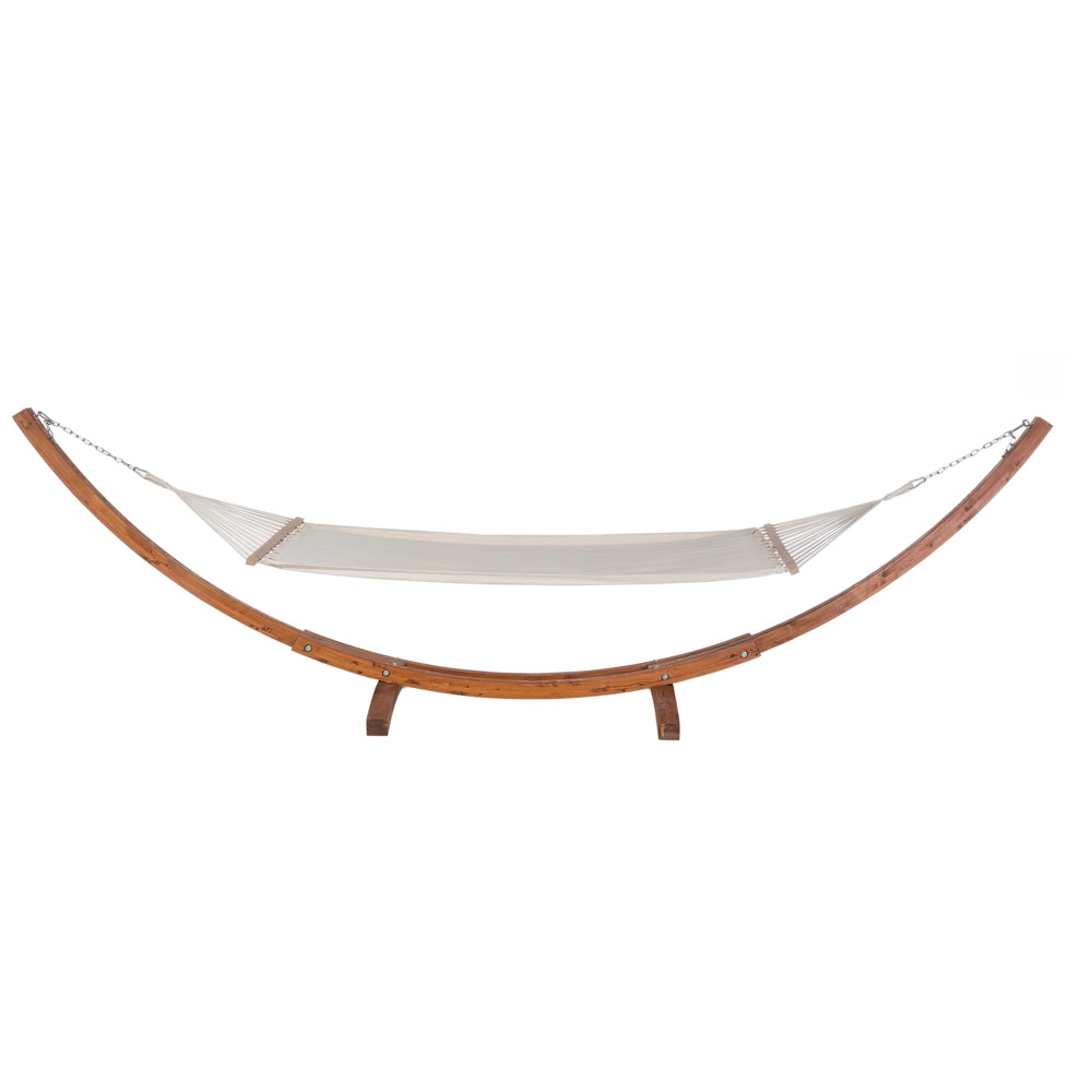 Amaca da giardino in cotone bianco con supporto ad arco in legno massello scuro autoportante