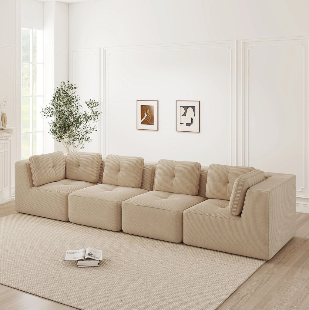 Divano angolare modulare in velluto a coste beige con seduta bassa e braccioli larghi