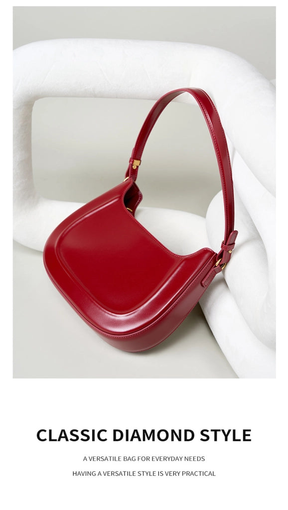 Borsa a tracolla da donna in vera pelle, modello Crescent, alla moda, colore rosso.