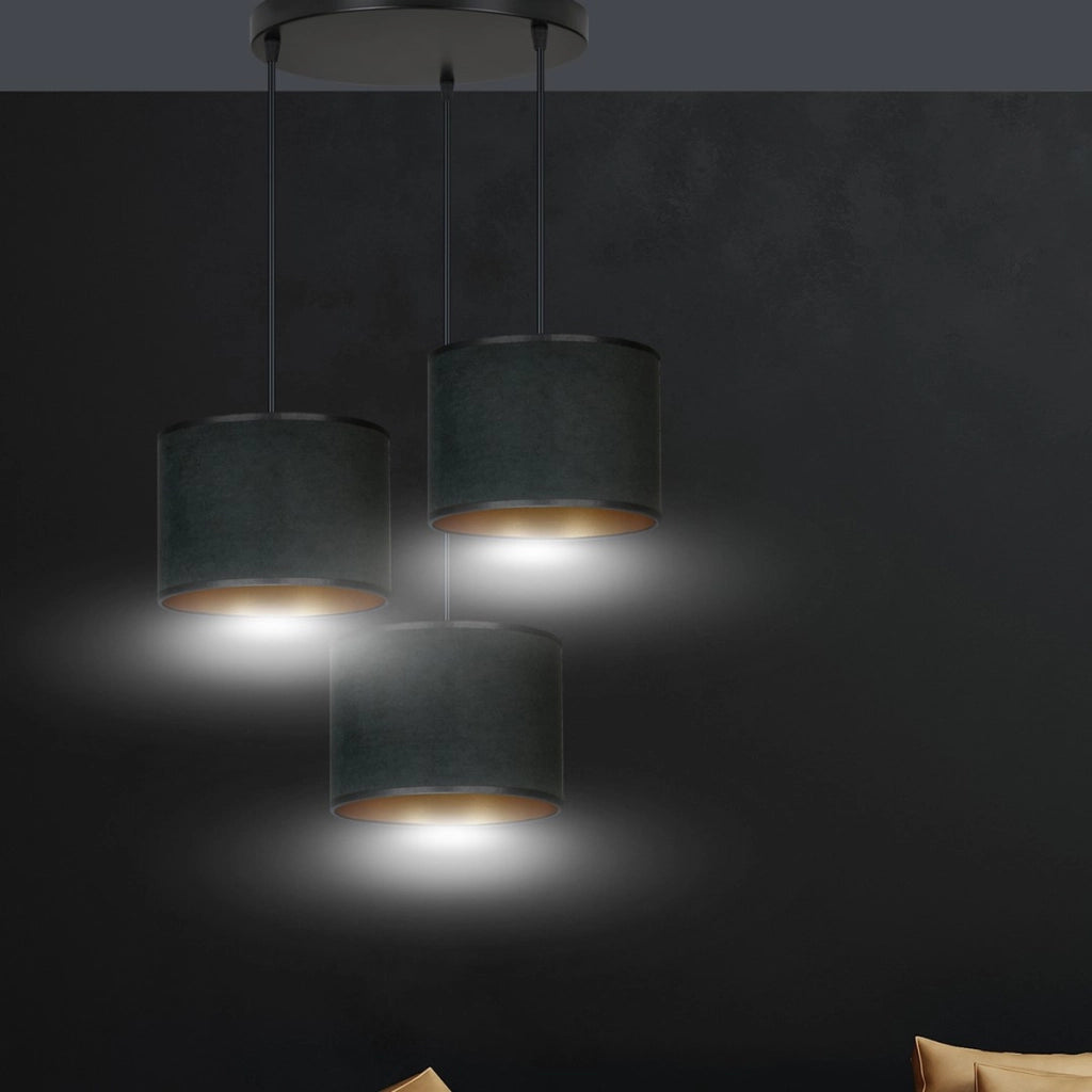 Lampada a sospensione Hilde in acciaio e velluto nero e oro