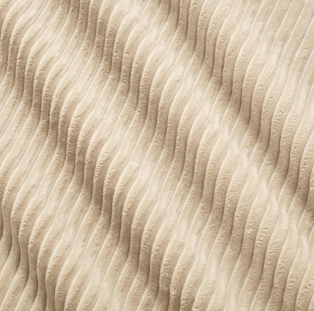 Divano modulare in velluto a coste beige; design boneless con seduta profonda e senza montaggio