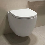 Wc sospeso in ceramica bianca con design ovale e scarico rimless Velora