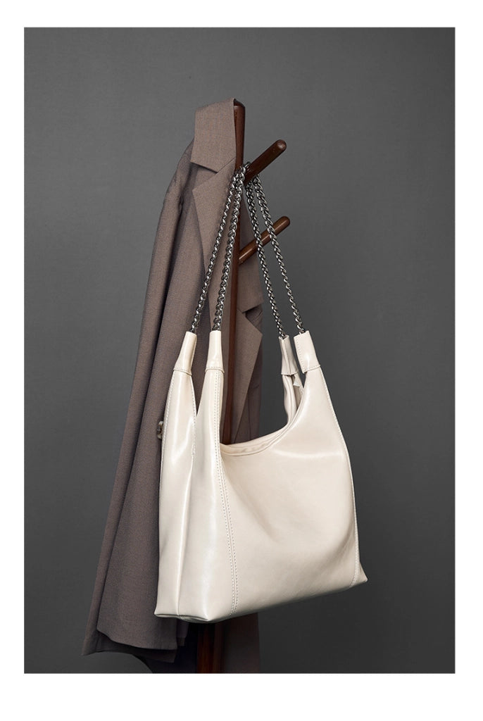 Borsa a tracolla da donna in vera pelle, graziosa e carina, colore bianco.