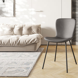 Sedia in pelle PU per sala da pranzo in colore grigio scuro. Collezione ALCAN