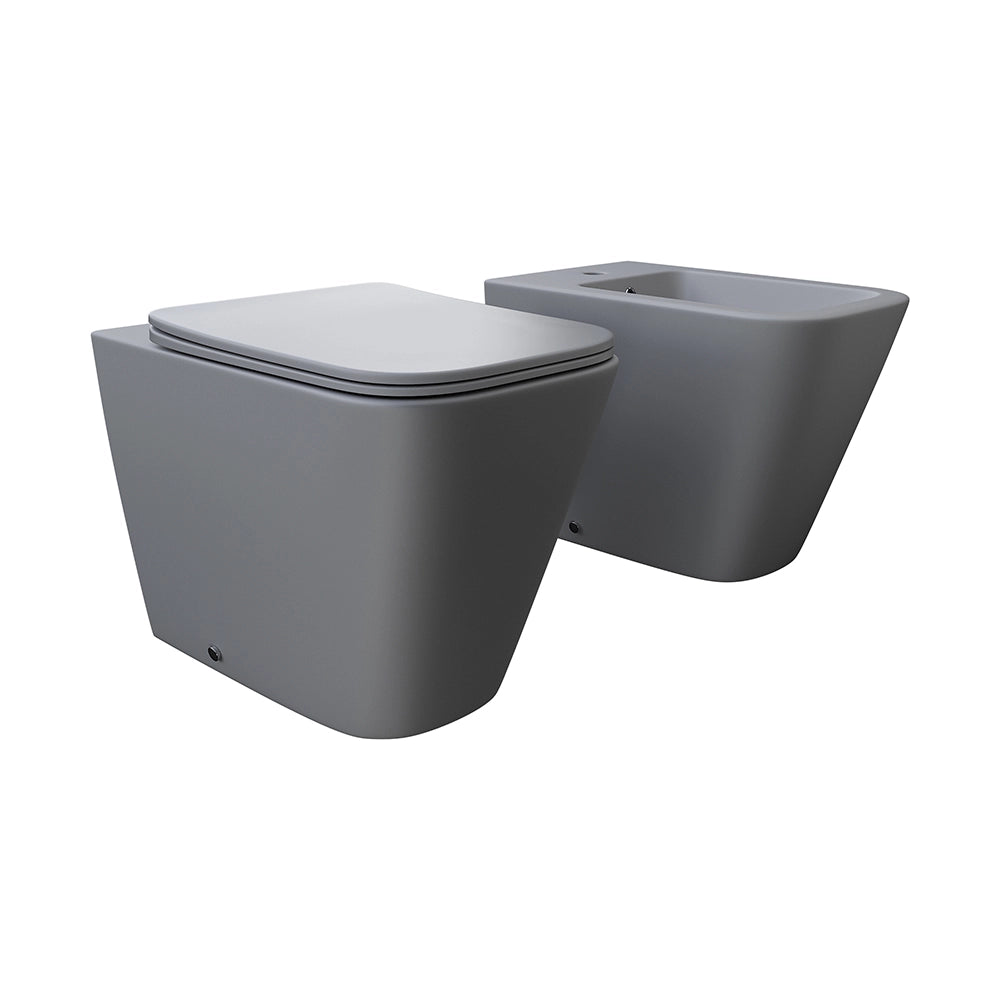 Coppia sanitari in ceramica filomuro vaso rimless, bidet e copri-wc grigio opaco | Kyoto