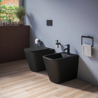 Coppia sanitari in ceramica filomuro vaso rimless, bidet e copri-wc nero opaco | Kyoto