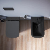 Coppia sanitari in ceramica filomuro vaso rimless, bidet e copri-wc nero opaco | Kyoto