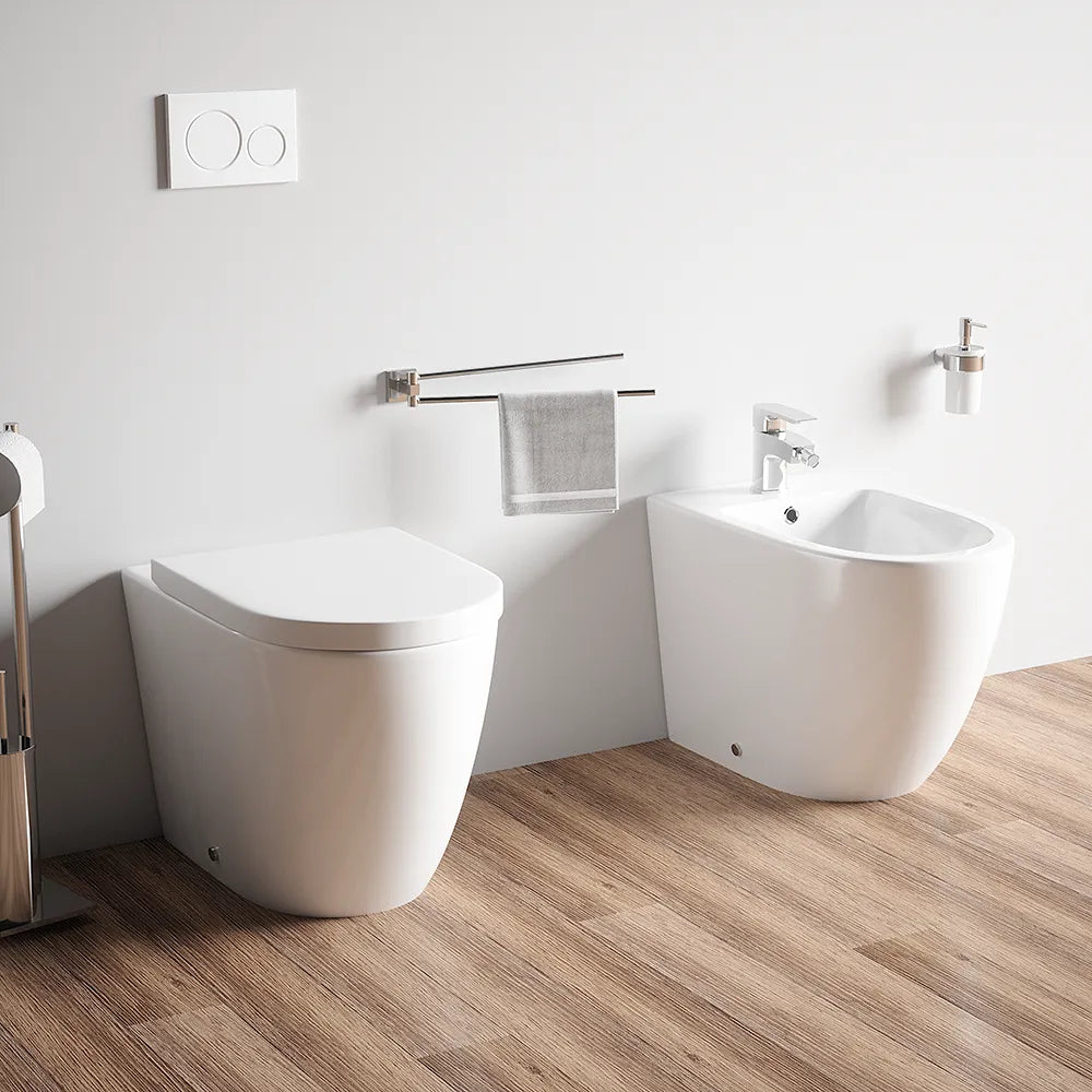 Sanitari filo muro in ceramica senza brida vaso traslato + bidet + sedile soft-close  | Roma