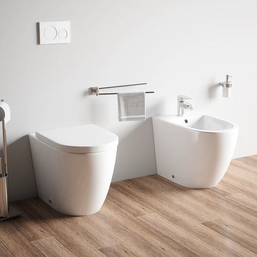 Sanitari filo muro in ceramica senza brida vaso traslato + bidet + sedile soft-close  | Roma