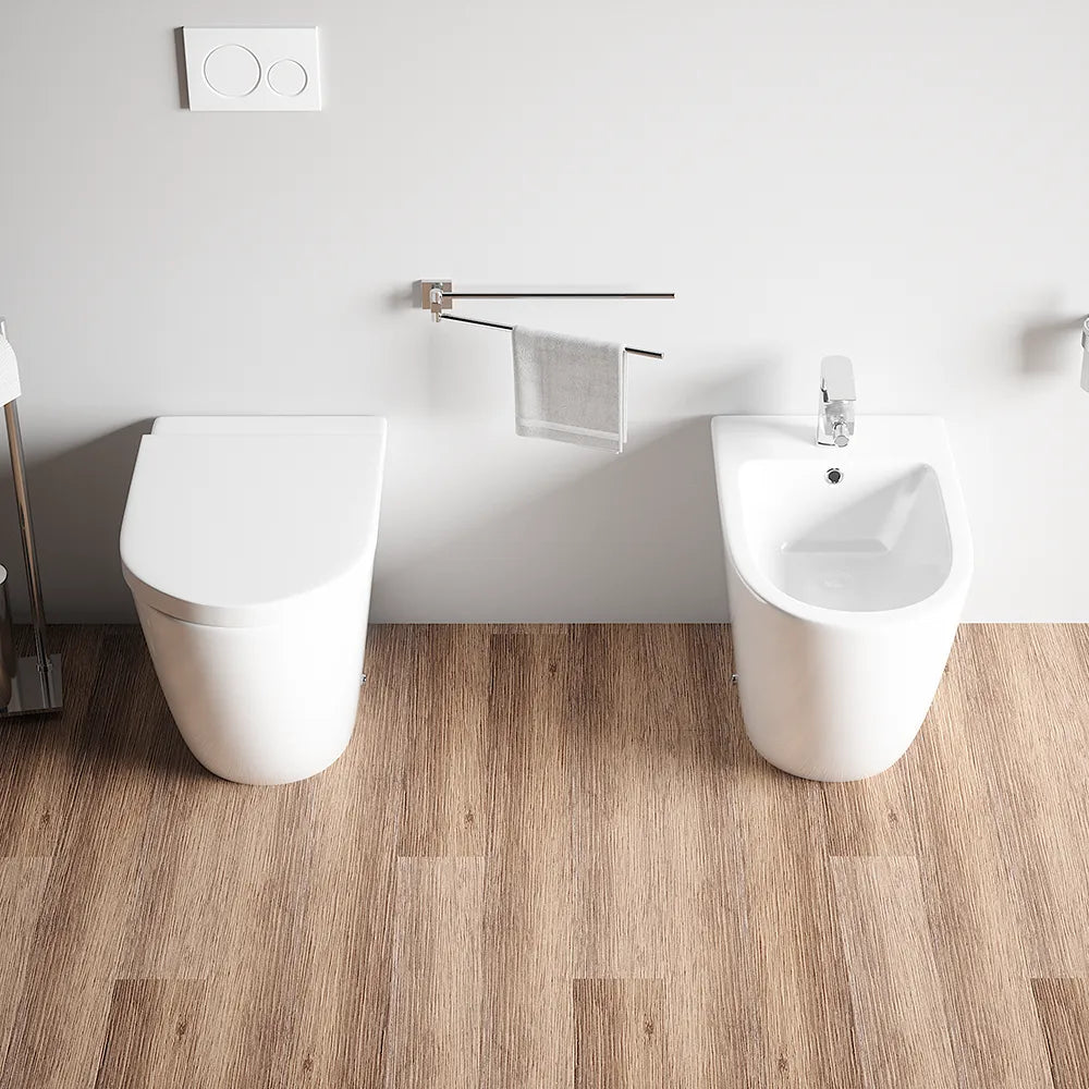 Sanitari filo muro in ceramica senza brida vaso traslato + bidet + sedile soft-close  | Roma