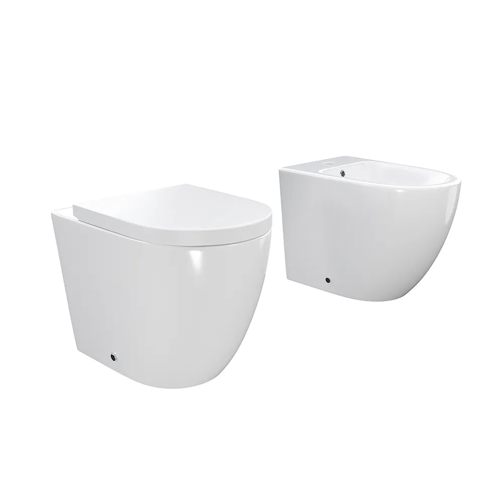 Sanitari filo muro in ceramica senza brida vaso traslato + bidet + sedile soft-close  | Roma