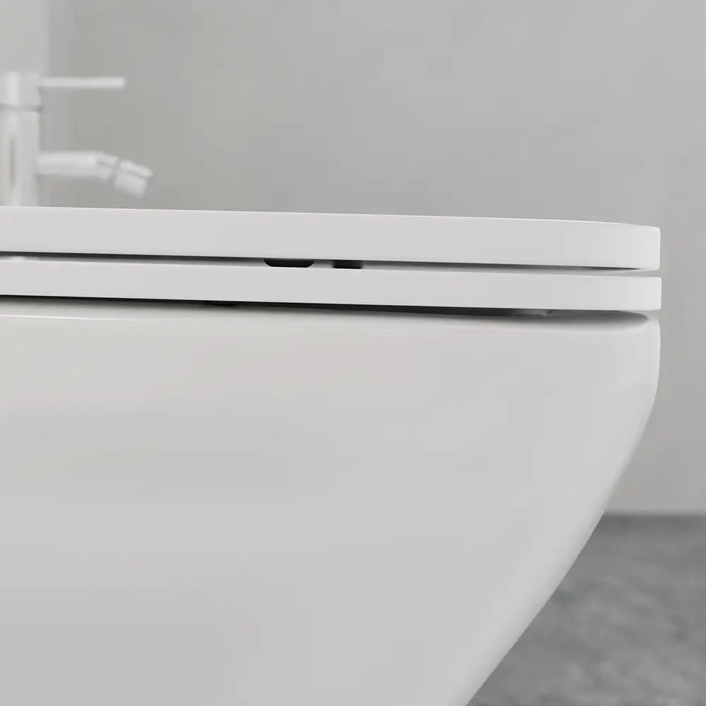 Coppia di sanitari sospesi rimless in ceramica bianca: vaso bidet e copriwc soft-close | Havana