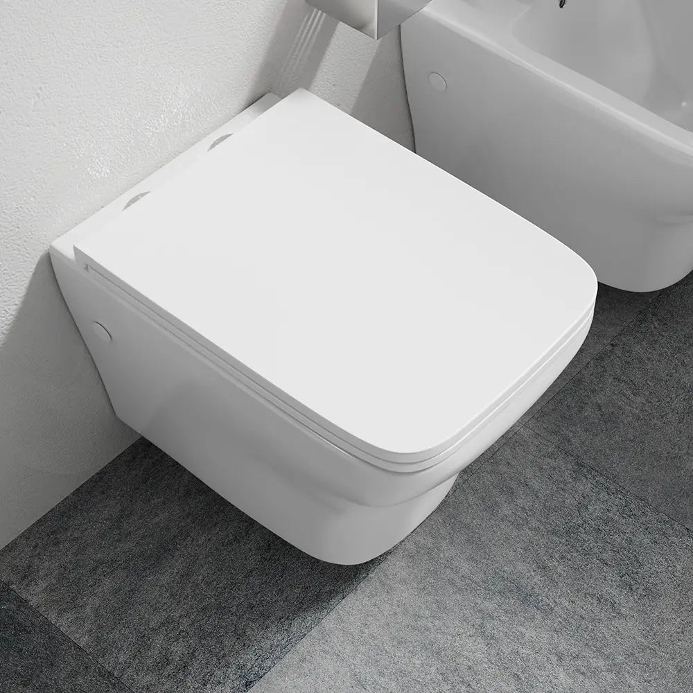 Coppia di sanitari sospesi rimless in ceramica bianca: vaso bidet e copriwc soft-close | Havana