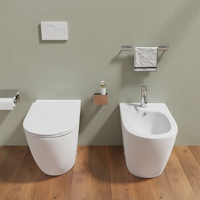 Sanitari filomuro in ceramica bianco opaco vaso rimless con copriwc soft-close e bidet | Europa