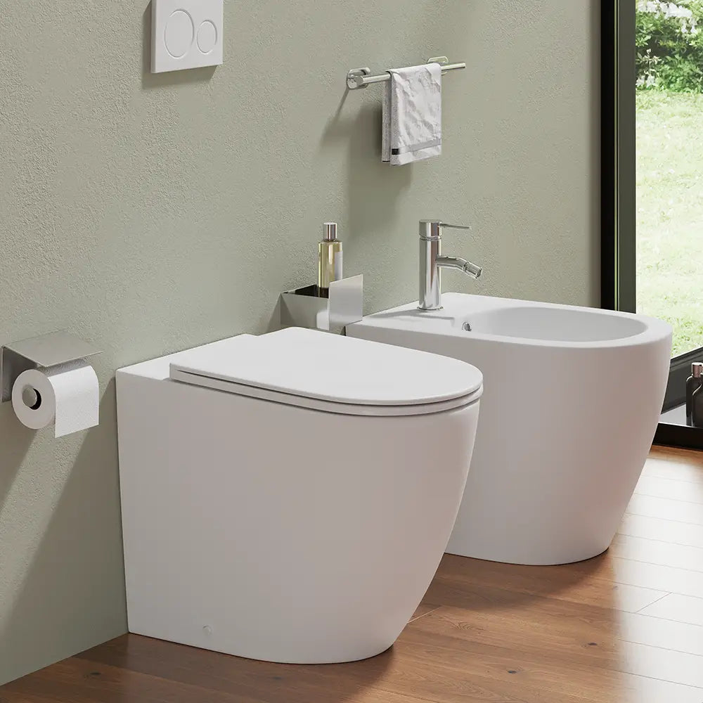 Sanitari filomuro in ceramica bianco opaco vaso rimless con copriwc soft-close e bidet | Europa