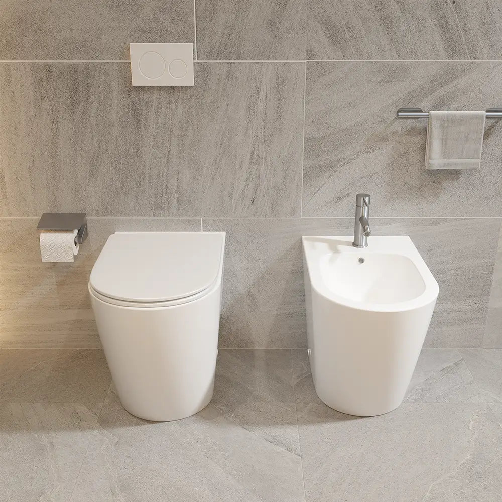 Sanitari filomuro comfort in ceramica bianco lucido vaso rimless h44,5 cm con copriwc soft-close e bidet | Europa