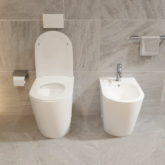 Sanitari filomuro comfort in ceramica bianco lucido vaso rimless h44,5 cm con copriwc soft-close e bidet | Europa