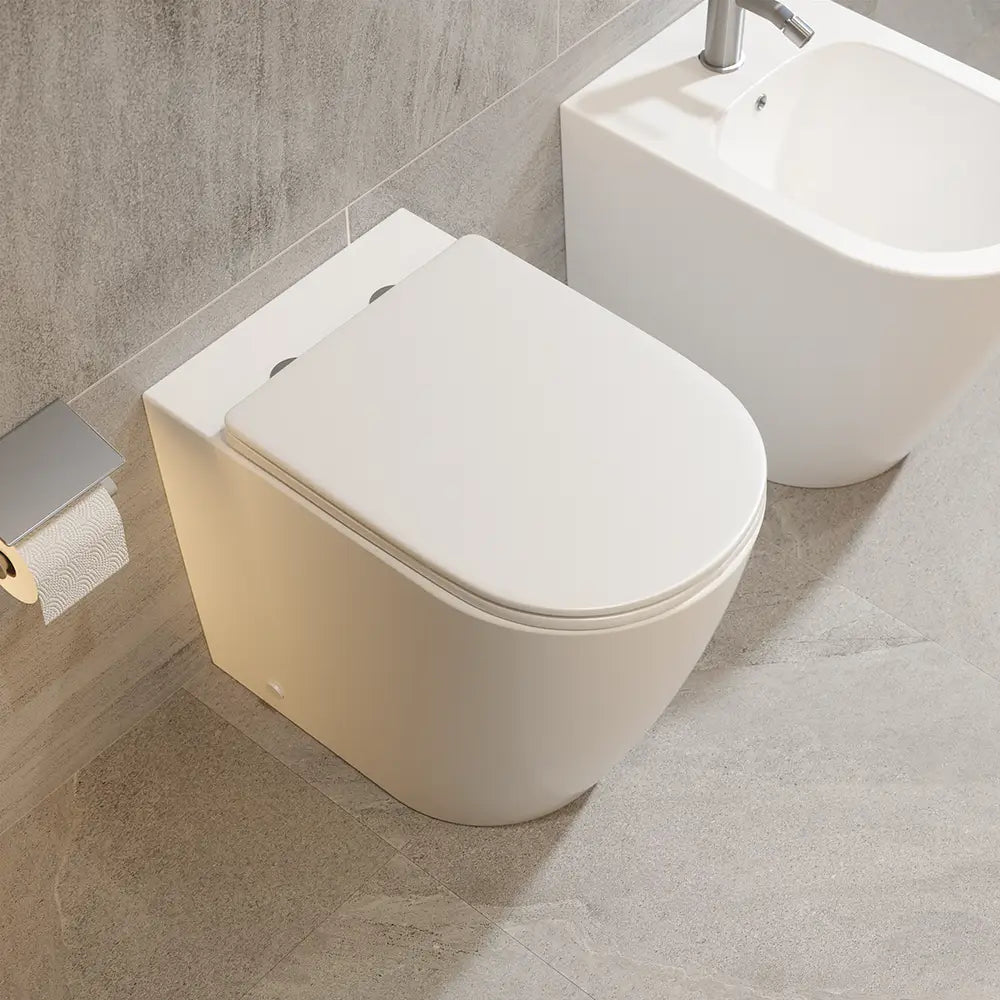 Sanitari filomuro comfort in ceramica bianco lucido vaso rimless h44,5 cm con copriwc soft-close e bidet | Europa