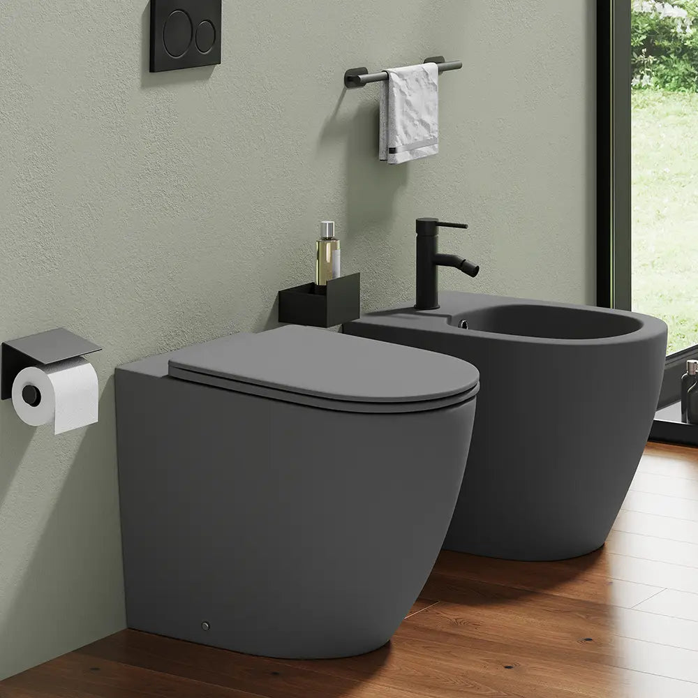 Sanitari filomuro in ceramica grigio opaco vaso rimless con copriwc soft-close e bidet | Europa