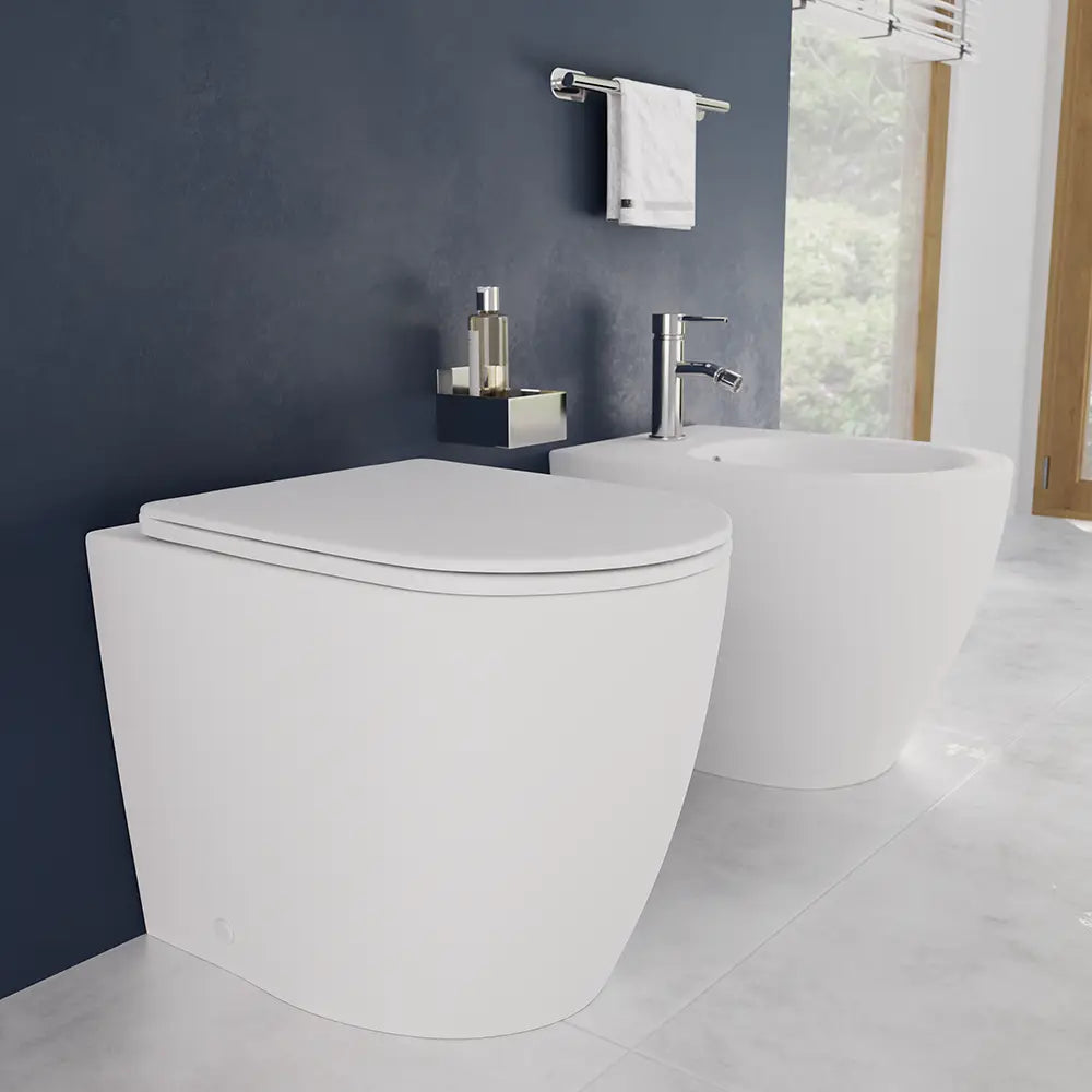 Coppia di sanitari filomuro ceramica bianco opaco vaso rimless copriwc soft-close e bidet | Europa Small
