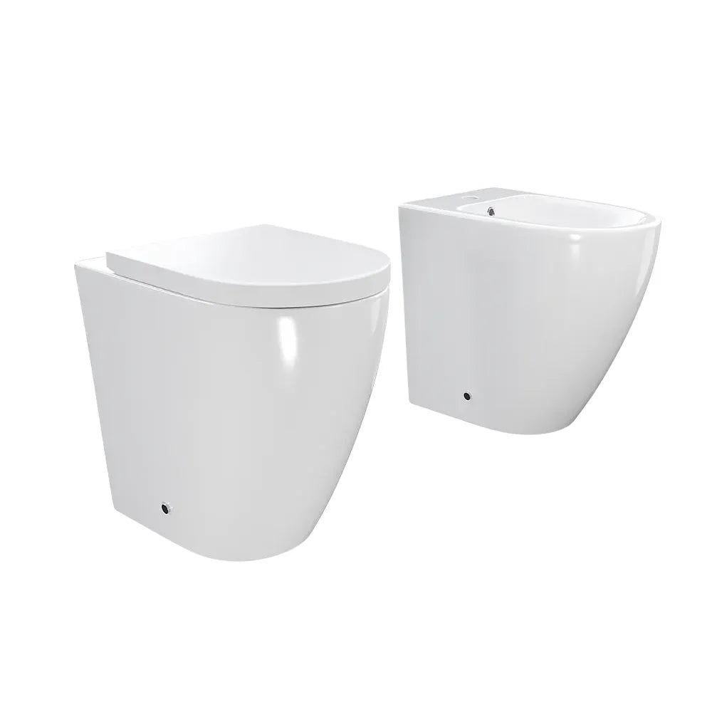 Coppia sanitari filomuro vaso rimless h 50 cm sedile soft-close e bidet | Roma Comfort