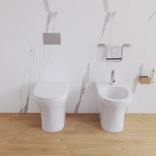 Sanitari filomuro rimless in ceramica bianco lucido: vaso bidet e copriwc soft-close | Nassau