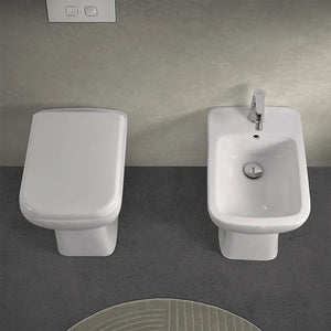 Coppia wc e bidet con scarico a pavimento e copriwc originale Ginevra