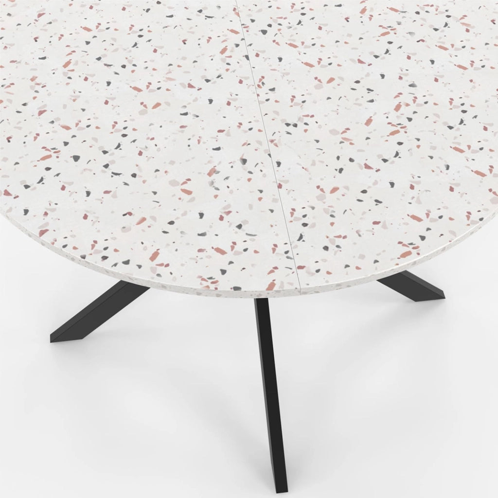 ALIX Tavolo da pranzo rotondo per 6 persone con gamba a ragno nera e piano effetto terrazzo SIMONE 110 cm