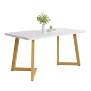 Tavolo da pranzo per 4 persone con piano effetto marmo e gambe in metallo dorato; in MDF; 117 x 68 x 75 cm