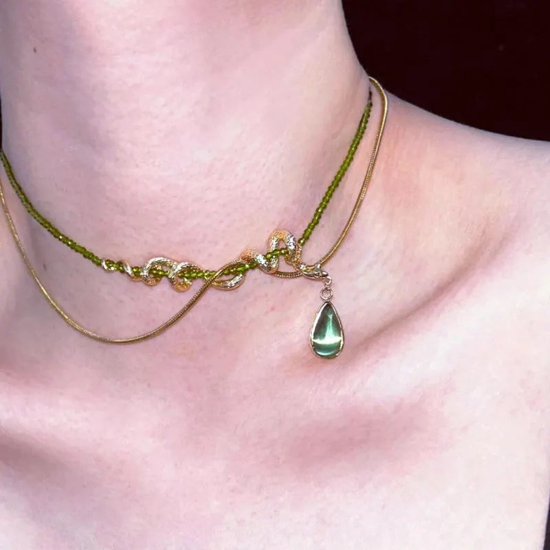 Collana a serpente fatta a mano con perline di cristallo verde, regalo di Natale o di compleanno.