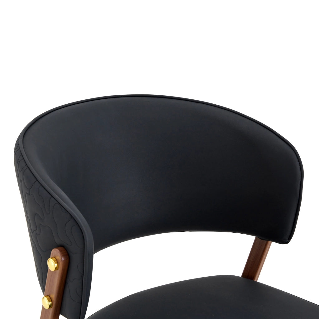 Sedia da pranzo moderna in ecopelle con schienale ergonomico e gambe in metallo nera